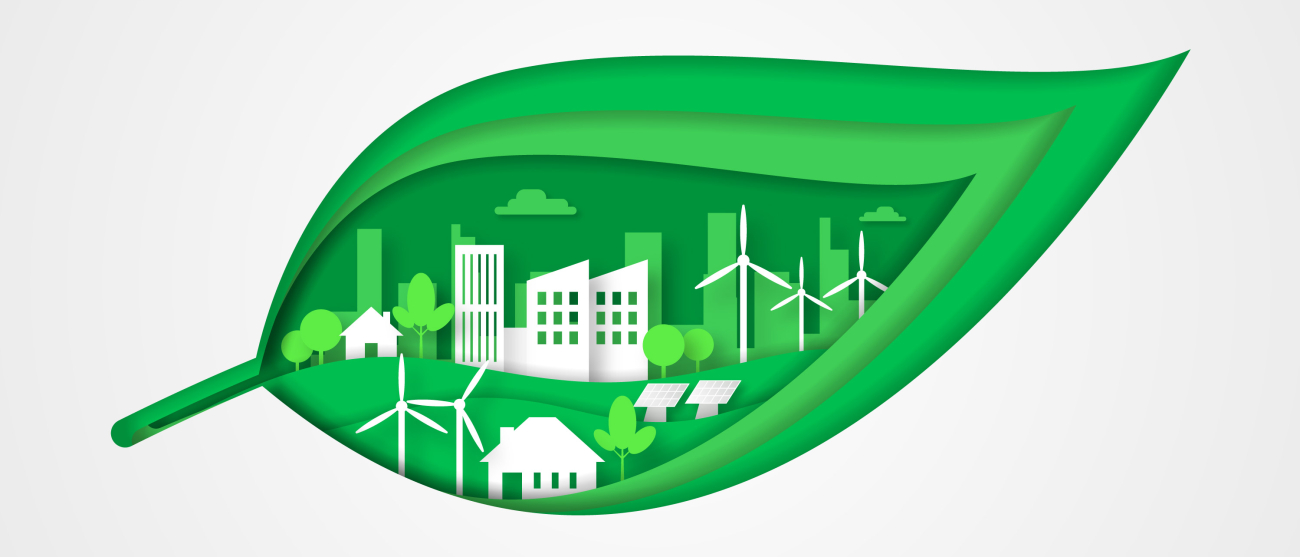 Grafika liścia z miastem , wiatraki i panele słoneczne.